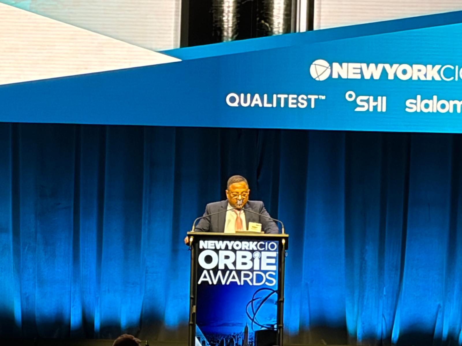 Suvajit Basu speaking at the ORBIE Awards podium